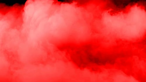 Red Smoke Billowing Abstractly on Black Background