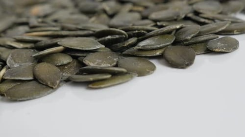 Pile of Green Pumpkin Seeds in Close Up