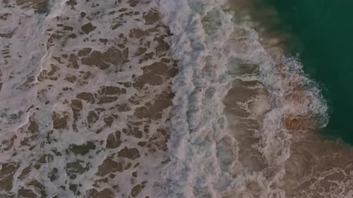Summer Seascape From Air Coast with Waves As a Blue Water Background