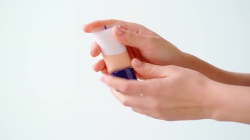 Foundation Applied From Tube Onto Hand
