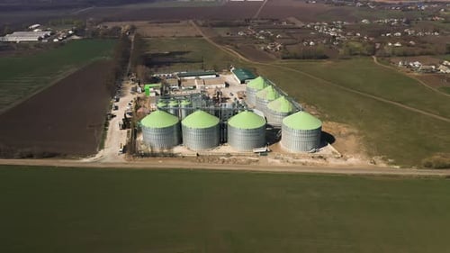 Agricultural Grain Silos on Rural Farmland from Above