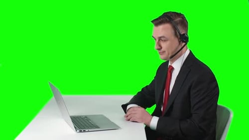 Man Talking on Video Call in Green Screen Studio