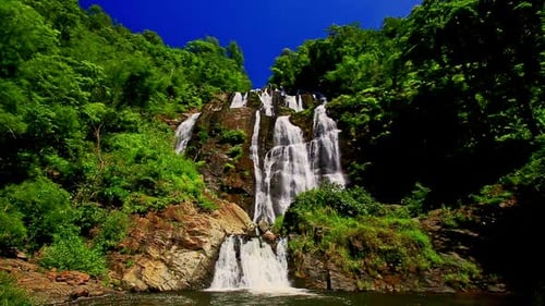 Foamy Mountain Waterfall Cascade in Tropical Park
