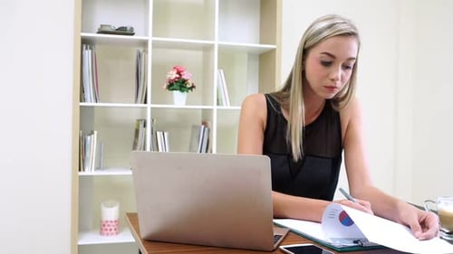 Blonde Business Woman Working at Modern Office