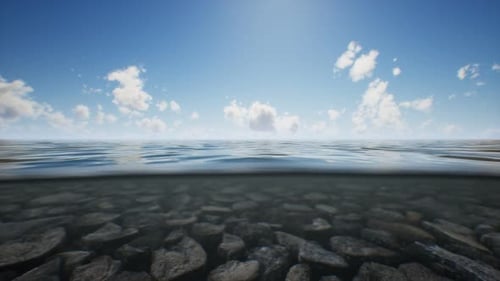 Ocean Seascape with Sky and Ocean Wave Splitted By Waterline to Underwater Part