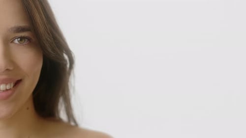 Attractive Young Woman Smiling in Beauty Portrait