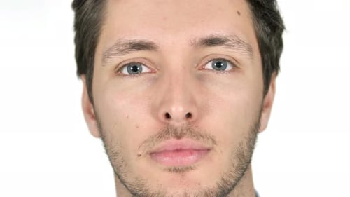 Close Up of Serious Young Man Face, White Background