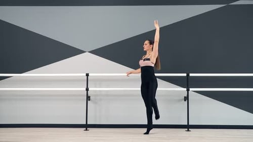 Female Dancer Training in Ballet Studio