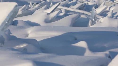 Broken Ice Piled Up on a Shore of Baikal Lake, Russia