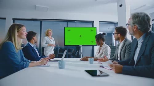 Business Team at Meeting with Green Screen