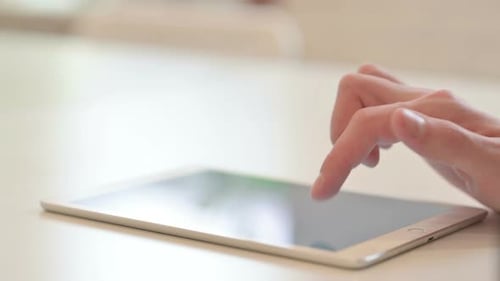 Close Up of Using Digital Tablet