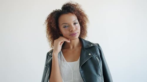 Beautiful African American Woman Model Posing for Camera in Studio Smiling