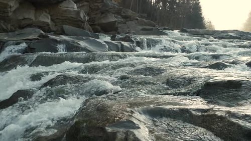 Raging Mountain River. Wildness of Clean, Clear Water in the Mountain River. Slow Motion