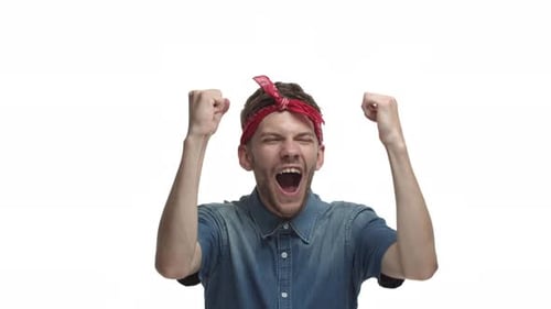 Man Cheers in Celebration Against White Background