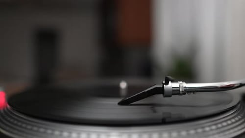Spinning Vinyl Record on Turntable Close Up