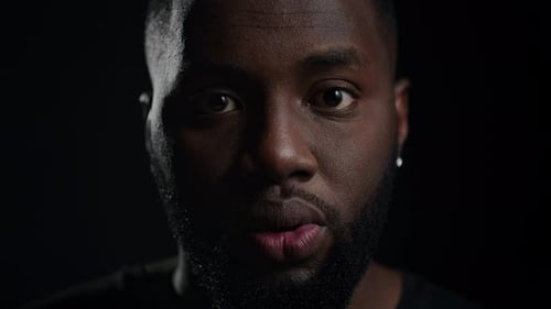 Joyful Man Posing in Studio