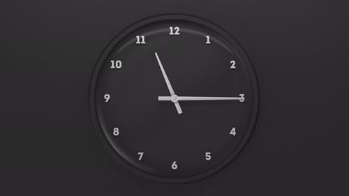 Black Clock on Black Backdrop with White Numbers and Arrows