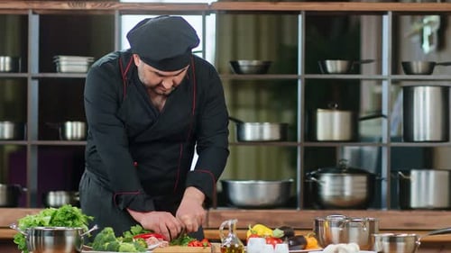 Chef Prepares Vegetables at the Counter