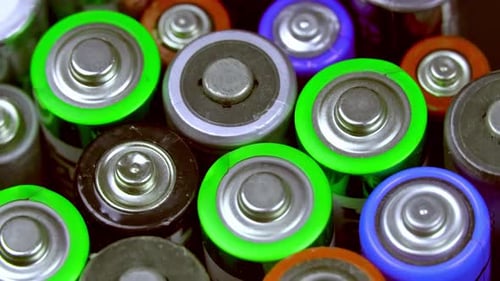 Collection of Multi-Colored Cylindrical Batteries Close Up