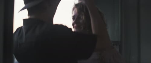 Loving Couple Embrace in City Apartment