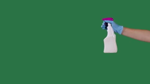 Spray Bottle Held in Gloved Hand on Green Screen