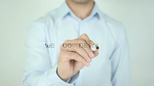 Man Writes "We Do Design" On Glass