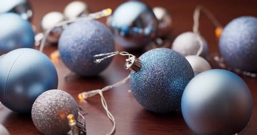 Elegant Blue and Silver Christmas Ornaments with Lights