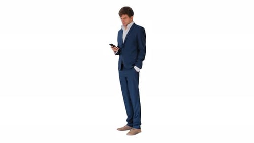 Young Adult Man in Suit Using Phone
