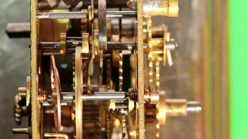 Clock Gears Turning in a Close Up View