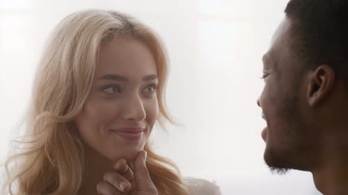 Affectionate Couple Sharing a Kissing Cheek