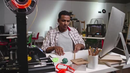 African Engineer Working on 3D Printing Project