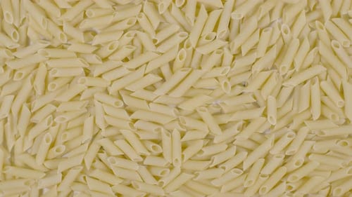 Close Up of Uncooked Penne Pasta