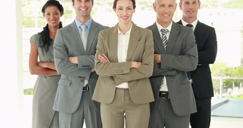 Diverse Professionals Smiling in Modern Office
