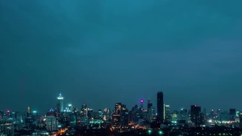 Time Lapse Night Cityscape and Highrise Buildings in Metropolis City Center
