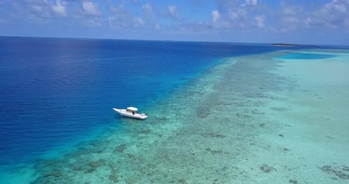 Wide angle drone copy space shot of a summer white paradise sand beach and aqua turquoise water back
