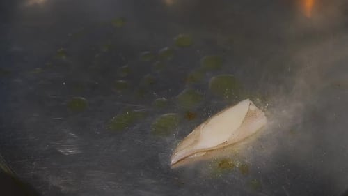 Fresh Squid Cooked on Metal Griddle