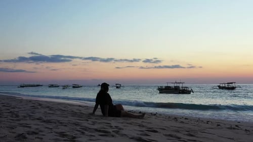 Lady happy and smiling on tranquil island beach lifestyle by aqua blue sea and white sandy backgroun