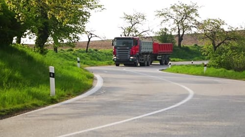Truck Rides on a Winding Road