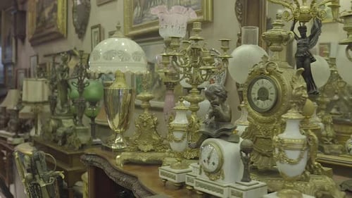 Antique Shop Gold And Copper Girandoles Clocks Statues