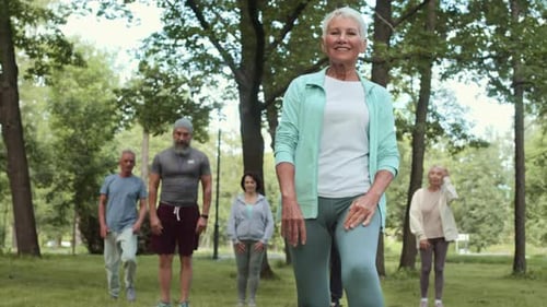 Seniors Doing Lunges in Green Park