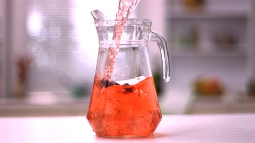 Jug of juice being poured