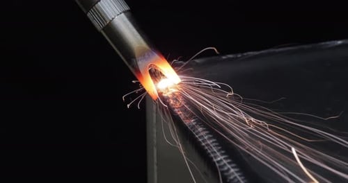 Welding Process Sparks and Equipment Close Up