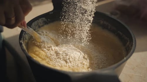 Adding Flour to Batter, Cooking at Home