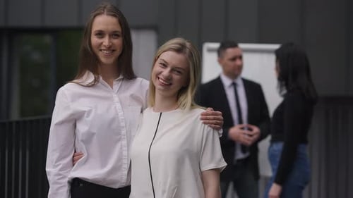 Friendly Business Meeting Outside Office Building