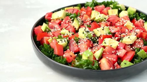 Colorful Kale Salad with Avocado and Tomatoes