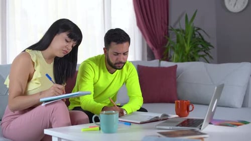 Couple Studying Together at Home