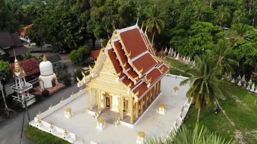 Classic Buddhist Temple Between Forest. From Above Drone View Buddhist Monastery Between Green Trees