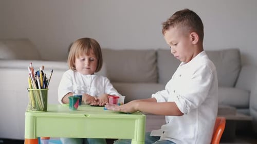 Children Making Things with Clay at Home