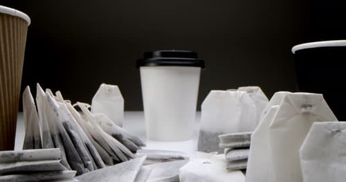 Tea Bags in a White Cup of Tea