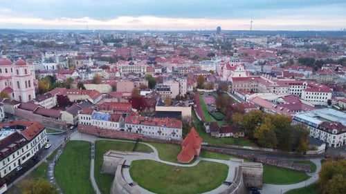 Flying Over Bastion of the Vilnius Defensive Wall In Old Town Vilnius In Lithuania. wide aerial 4k